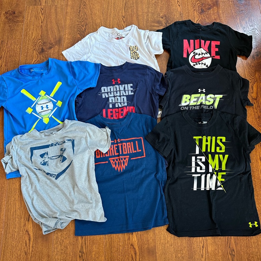 8 youth XS Nike and Under Armor t-shirts.